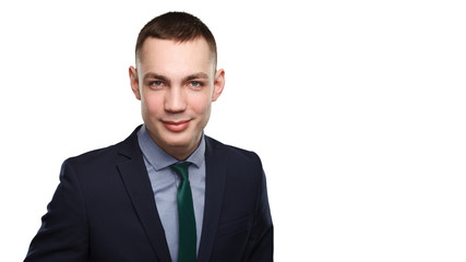 Well dressed successful young man isolated over white background with copy space