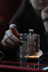 pouring tea into a glass