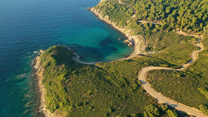 Aerial drone photo of secluded emerald beach of Krifi or "hidden beach" in island of Skiathos, Sporades, Greece