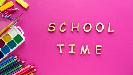 School supplies on pink background. School time. Back to school concept