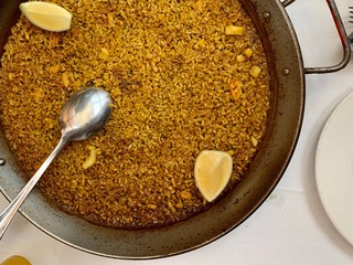 Arroz a banda, a delicious traditional meal from Valencia and Alicante (Spain), made with rice, fish and seafood similar to paella