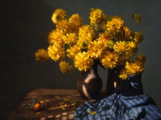 Autumn still life with yellow flowers