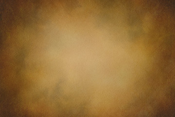 Texture for artwork and photography. Abstract dark yellow stained paper texture background or...