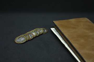 Fototapeta na wymiar leather wallet with money