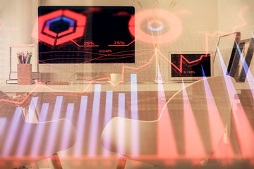 Double exposure of stock market graph drawing and office interior background. Concept of financial analysis.