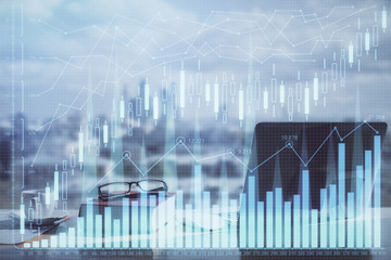 Double exposure of financial chart drawings and desk with open notebook background. Concept of forex market