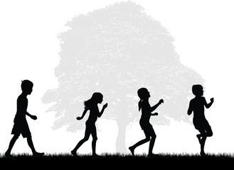 Silhouettes of children playing outside.