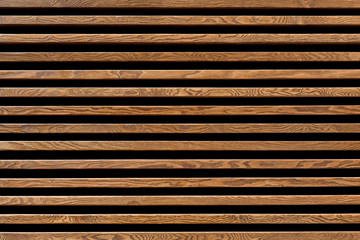 Texture of wood lath wall background. Seamless pattern of modern wall paneling with horizontal...