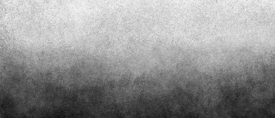black and white chic monochrome gangered background with paint gradient from white to black. Color transition, mixing, graininess.