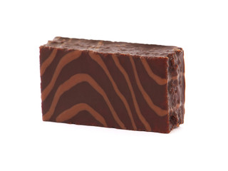 Cake bar covered with chocolate isolated on white
