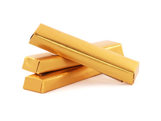 Chocolate bars wrapped in golden aluminum foil isolated on white	