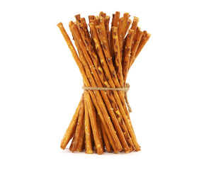 Pretzel sticks with salt tied with string, isolated on a white