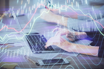 Multi exposure of woman hands typing on computer and financial chart hologram drawing. Stock market analysis concept.