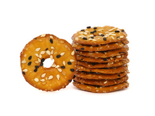 Flatten pretzel crackers with seeds isolated on white