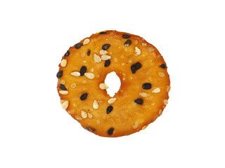Flatten pretzel cracker with seeds isolated on white