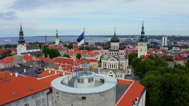Estonian flag on Tall Hermann Tower in the Old Town of Tallinn, Estonia