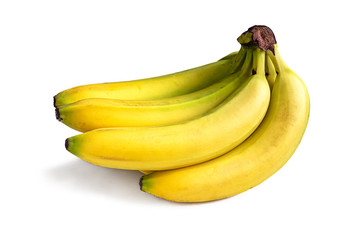 Few ripe yellow bananas on a white background
