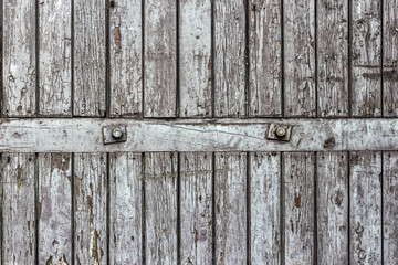Fragment of an old wooden gate