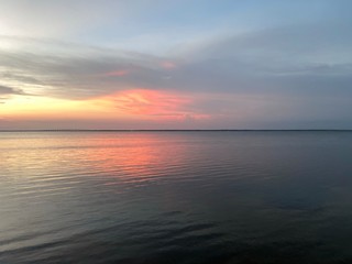 sunset over the bay water