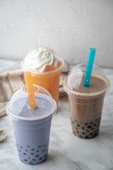 tapioca milk tea, taro potato tea, and thai tea