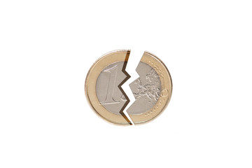 broken euro coin with white background. concept symbolizing the economic crisis in the euro area. 