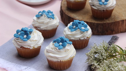 Cupcakes with blue flowers