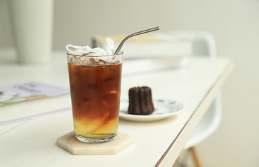 Americano iced coffee with dessert in home 