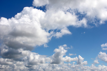 White fluffy clouds on blue sky nature background
