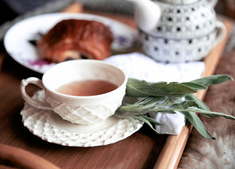 TEA AND CROISSANT