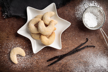 vanilla crescent cookies on a star shaped plate