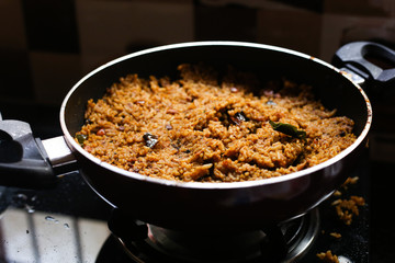 Cooked rice closed with transparent glass in the kitchen