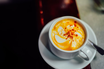 Coffee cup of cappuccino  on the wooden table ,Street coffee, top view.