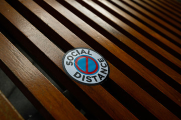 Social Distance sticker on mall bench