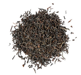 Dry black tea leaves isolated on white. Close-up top view