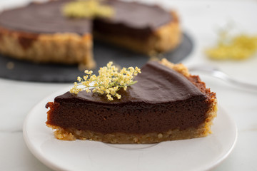 sweet home made chocolate elderflower cake on a table