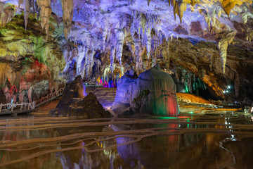 Fototapeta premium Ancient underground cave stalactites and groundwater landscape