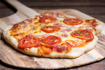 pizza on a wooden board