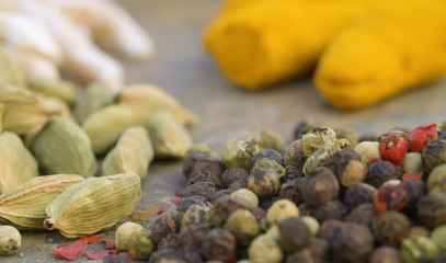 Spices on the table. Pepper, cardamom, turmeric