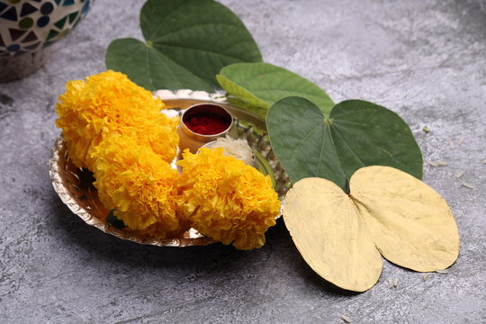 Dussehra or Vijaya dashami greeting card. Green leaf golden, colord leaf Rie and kumkum.
