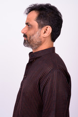 Obraz premium Portrait of mature handsome bearded Indian businessman