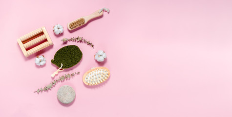 Spa and bath set on abstract pink background. Skin and body care concept. Top horizontal view copyspace