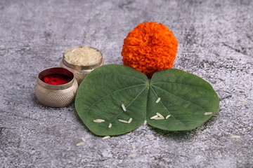Happy Dussehra greeting card , green leaf,Rie and kumkum