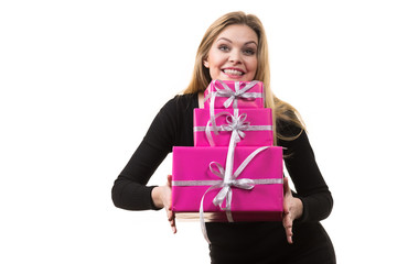 Girl holding stack of pink gift boxes