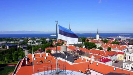 Estonian flag on Tall Hermann Tower in the Old Town of Tallinn, Estonia
