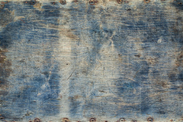 Rustic wooden plank background with bridges from rusty nails