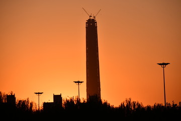 Silhouette of the highest skyscraper in Tianjin, China in sunset light