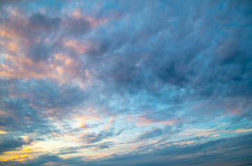 Clouds after rain on the sky at sunset.