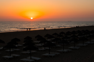 Sunset at La Barrosa beach in Sancti Petri, Cadiz, Spain © josevgluis