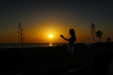 Fototapeta premium Sunset at La Barrosa beach in Sancti Petri, Cadiz, Spain