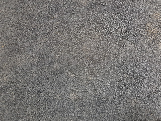 Surface grunge rough of asphalt, grey grainy road. Texture background, top view